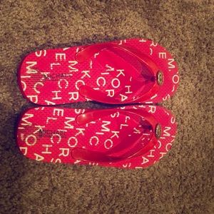 Michael Kors red and white shoes.